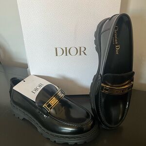 Dior Black Leather Men's Slip-On Loafers with Gold Logo Bar